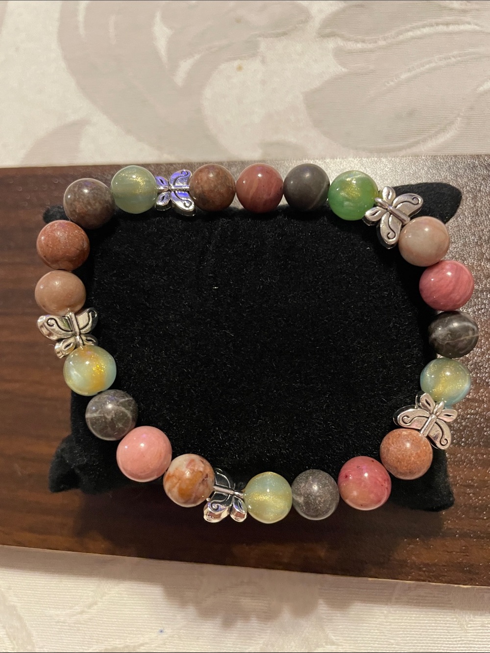 7” Stretch Butterfly Charm Bracelet with multi authentic stones.